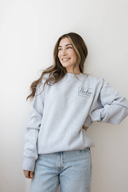Busy Hockey Mom | Everyday Essentials Sweater: Heather Grey / 2XLarge